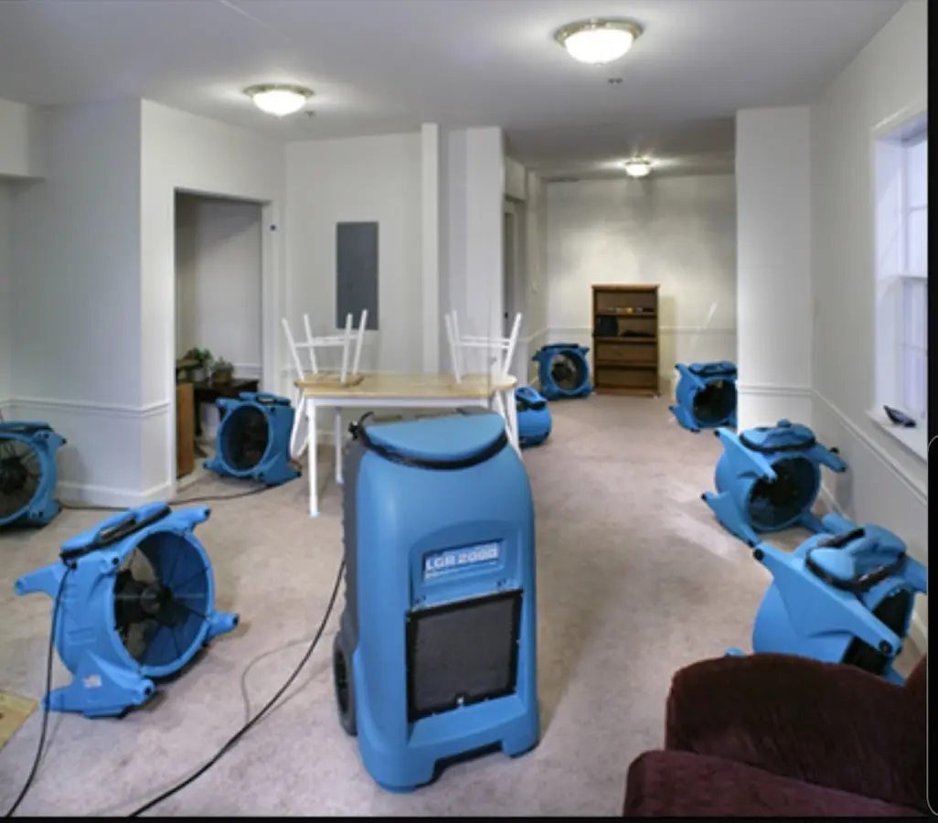 Air movers and dehumidifier setup for Water Damage Restoration in Dracut