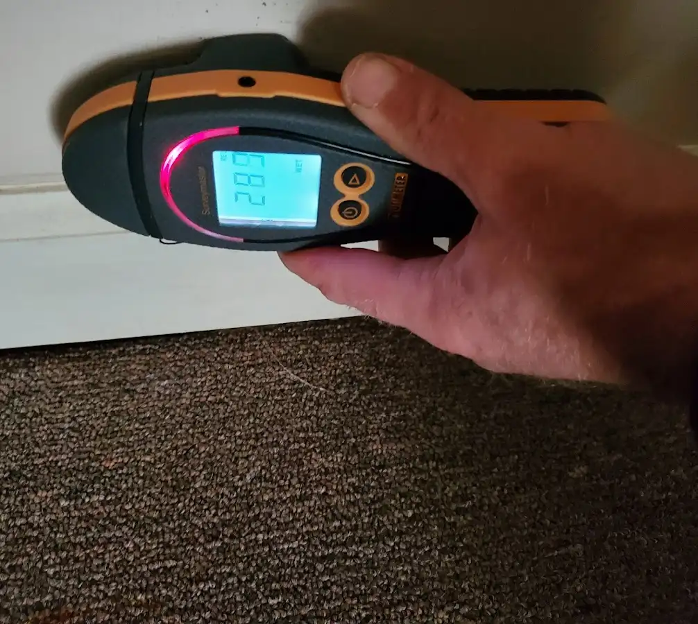 Moisture detection at baseboard during Burst Pipe Cleanup in Dracut